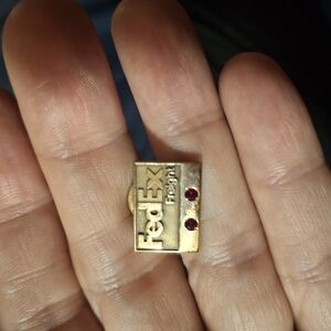 FedEx Freight Gold Pin with Red Accents